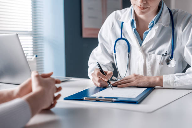 Doctor at Injury Clinic talking with patient